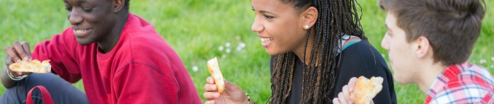 a group of people eating outside